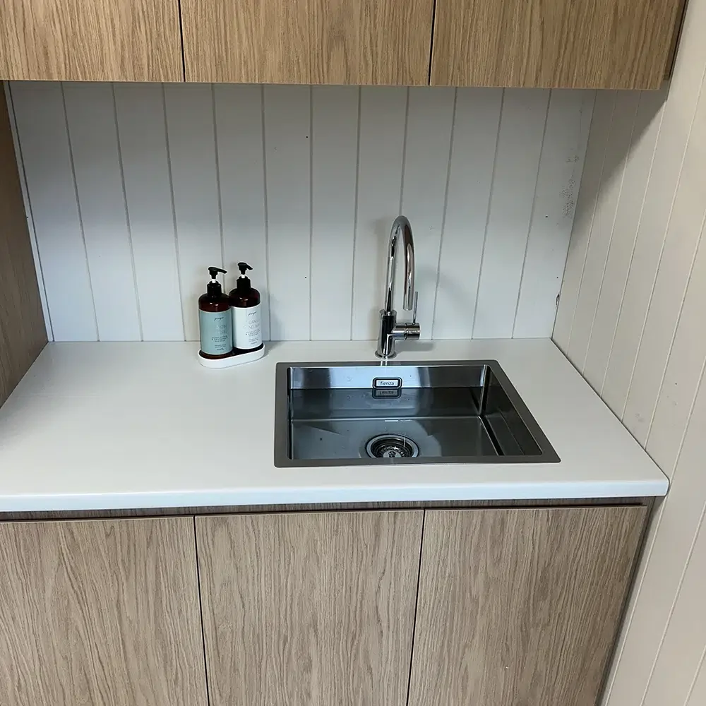 A Laundry renovation with new sink and taps installed on the Gold Coast