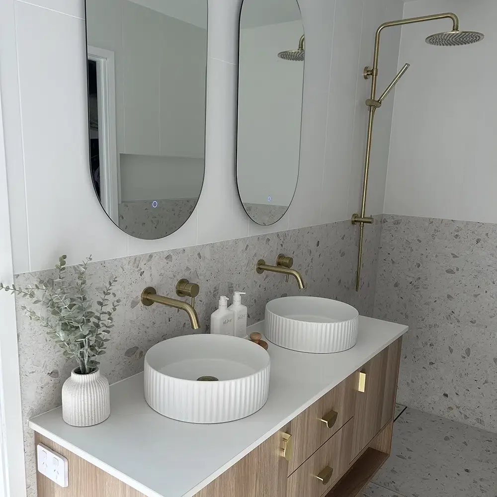 A Luxury Bathroom Renovation on the Gold Coast featuring double vanity, new taps and Shower Fittings