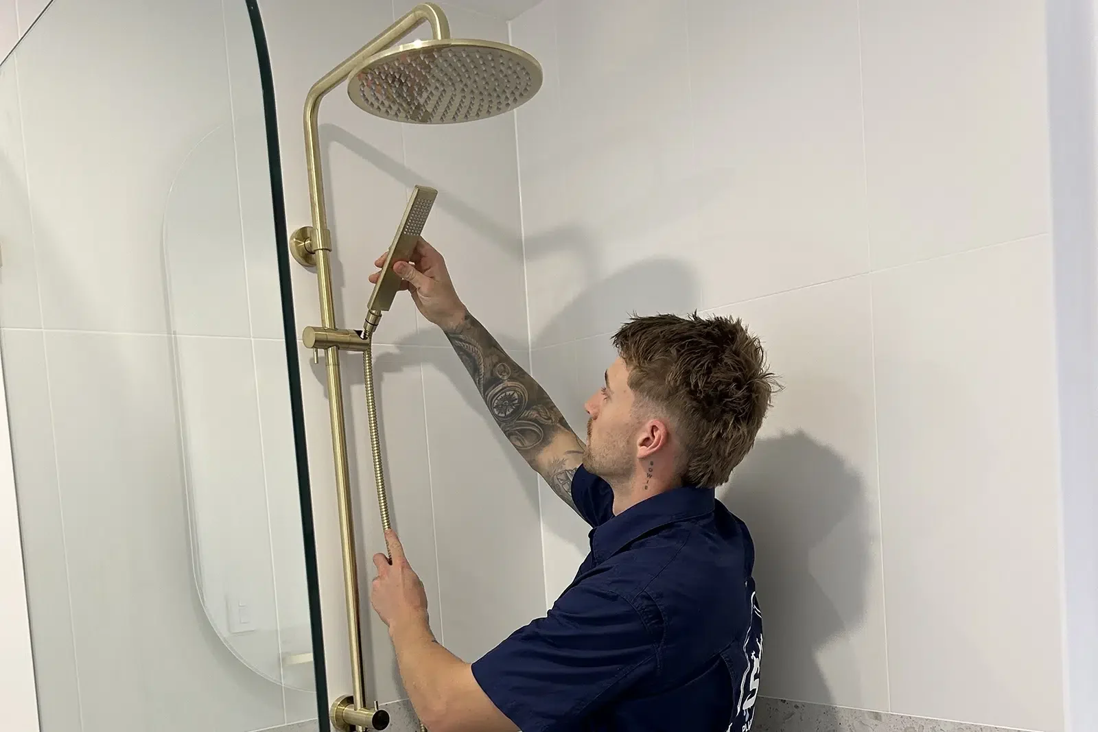 Sam Lennox of STL Plumbing is installing a new shower and also conducts Shower repairs on the Gold Coast