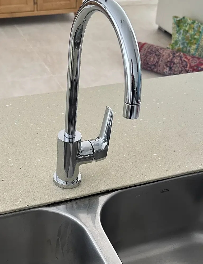 A kitchen installed by Sam Lennox of STL Plumbing who also does Tap Repairs on the Gold Coast