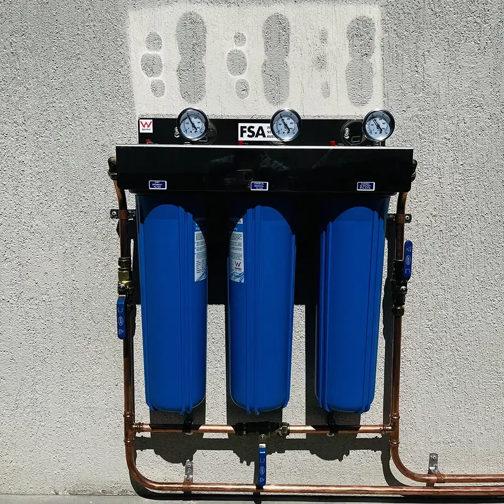 Water Filtration Installation on the Gold Coast. The System is mounted to an external house wall - STL Plumbing
